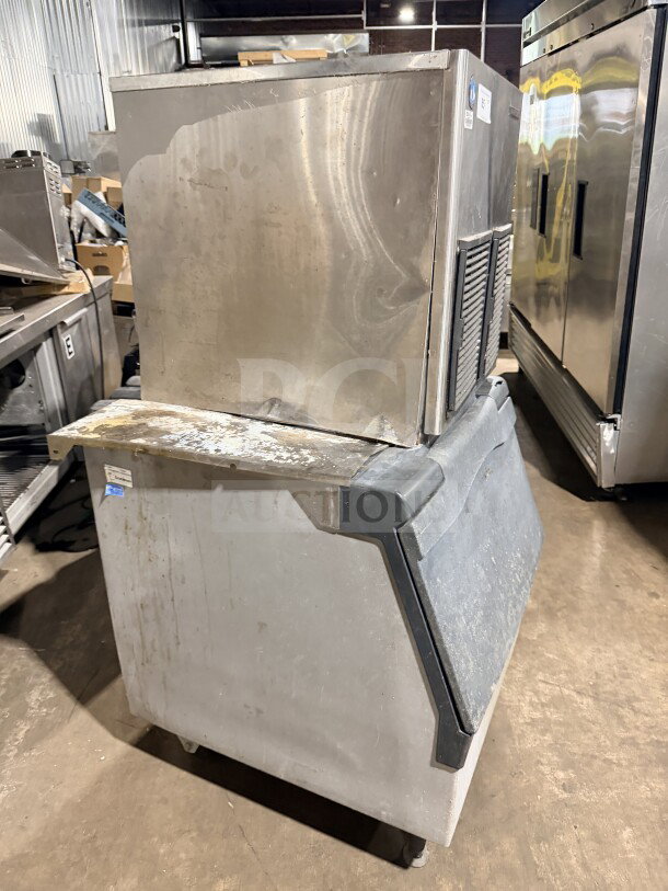 Hoshizaki stainless steel 22" air-cooled modular flake ice machine, model F-1001MAH, with insulated storage bin, used condition.