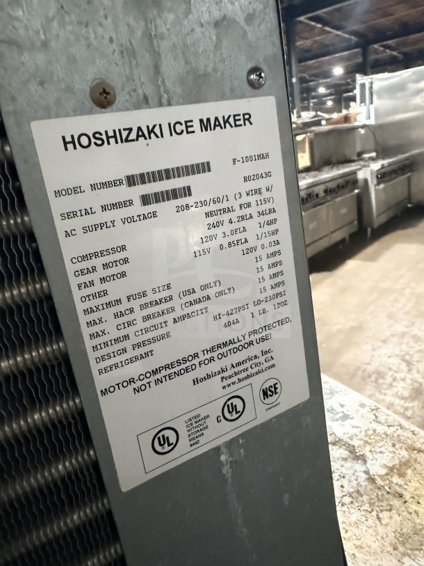 Hoshizaki F-1001MAH air-cooled flake ice machine head with insulated storage bin, model label visible, 208-230V, 1-phase.