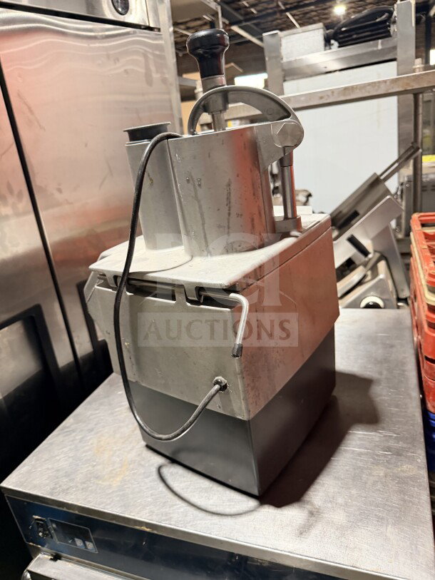 Robot Coupe CL50 commercial stainless steel countertop food processor, no discs, visible wear, includes power cord.