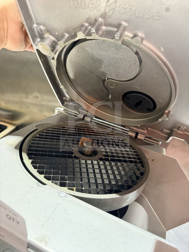 Robot Coupe CL50 commercial food processor, stainless steel, continuous feed, missing discs, intact markings, good condition.