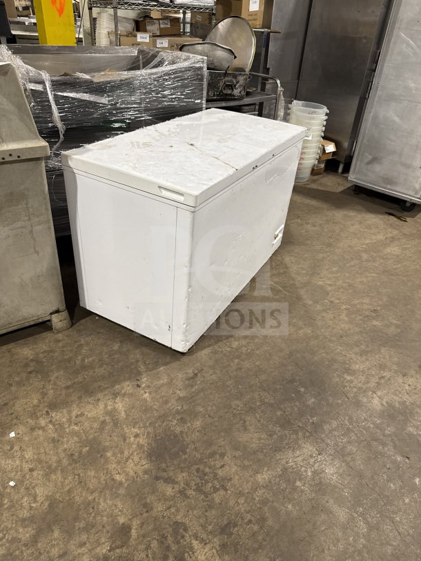 Nordon BO360 solid white reach-down chest freezer, 110V 1 Phase. Used condition with visible wear, suitable for storage.
