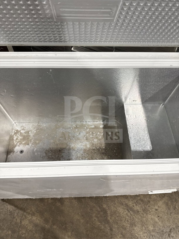 Nordon BO360 solid white reach-down chest freezer, 110V 1 Phase. Clean interior, some wear visible on the base.
