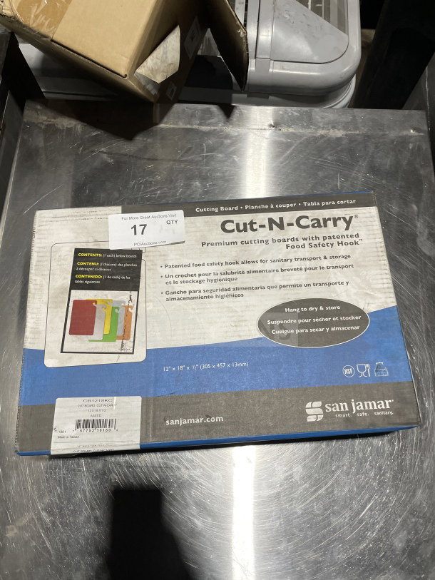 San Jamar Cut-N-Carry CB1218KC cutting board set, 6 boards, 12"x18", assorted colors, new in box with labels.