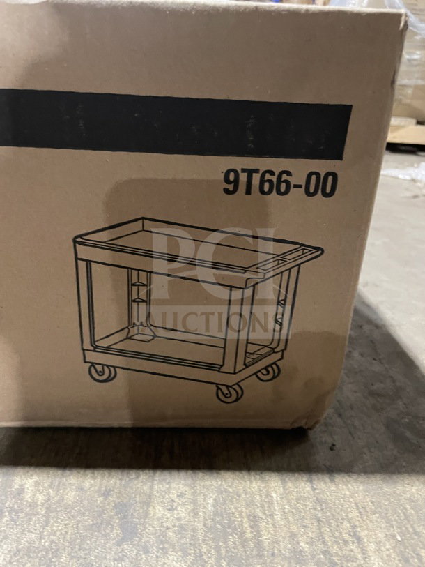 Rubbermaid Commercial Black Heavy Duty 2-Tier Utility Pushcart, Model FG9T6600BLA, new in box.