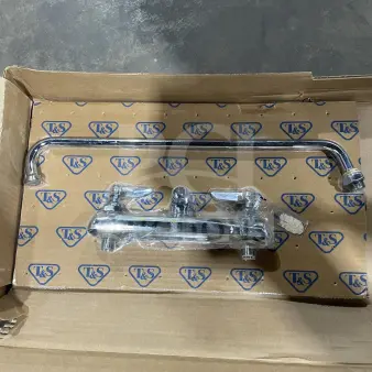 BRAND NEW T&S commercial brass wall-mount workboard mixing faucet with 12" swing nozzle in original packaging.