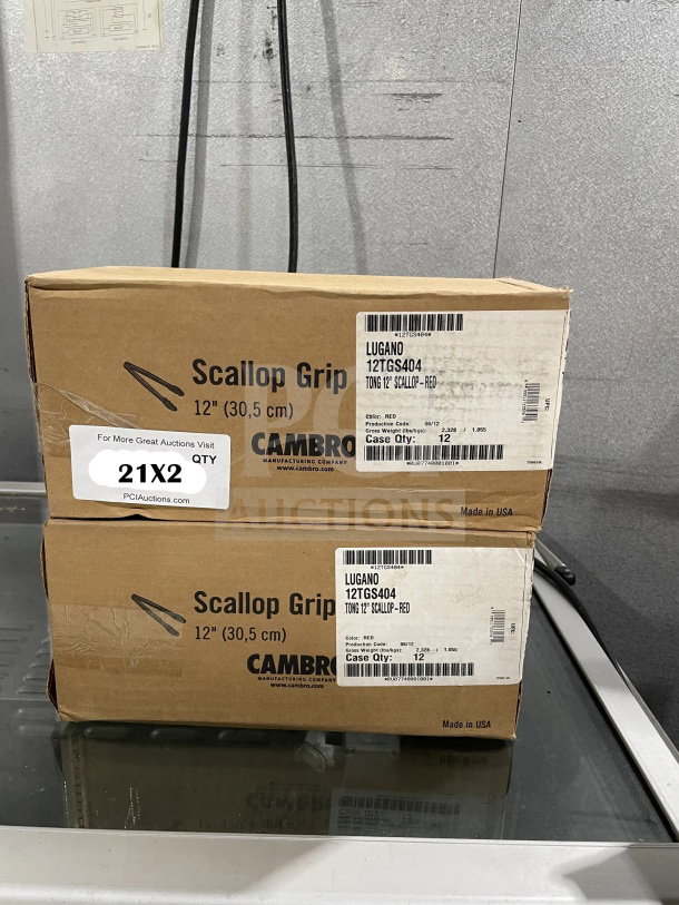 Two boxes of Cambro Lugano Series 12" red scallop grip tongs, model 12TGS404, each containing 12 units, brand new condition.