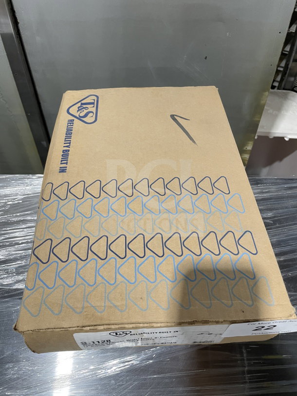 T&S Commercial Heavy-Duty Workboard Faucet, Model B-1128, new in box. Packaging shows T&S branding and reliability marking.