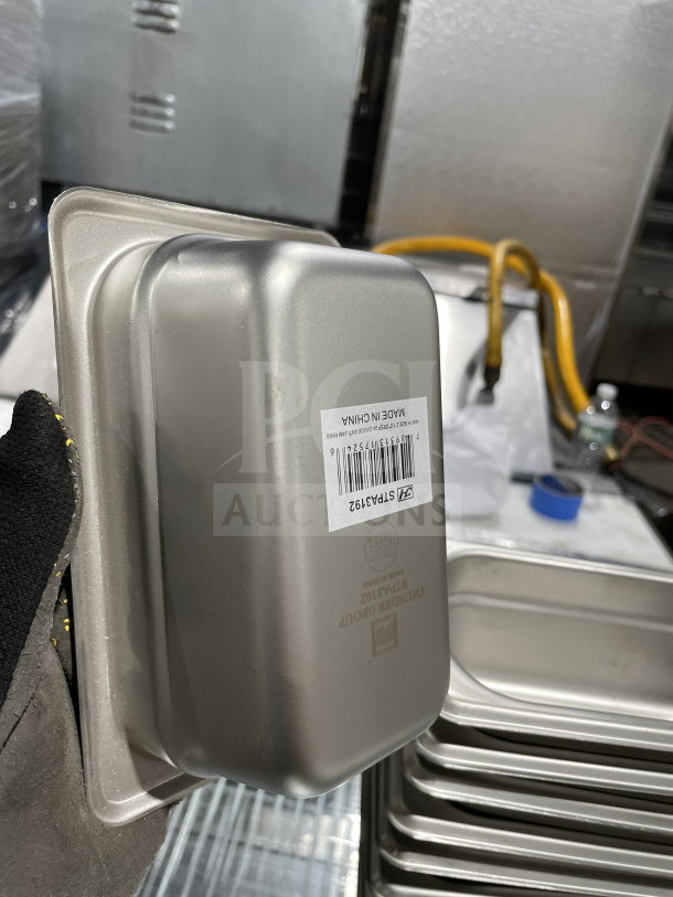 NEW Thunder Group STPA3192 stainless steel steam table pan, 1/9 size, 2.5" deep, anti-jamming corners, barcode label visible.