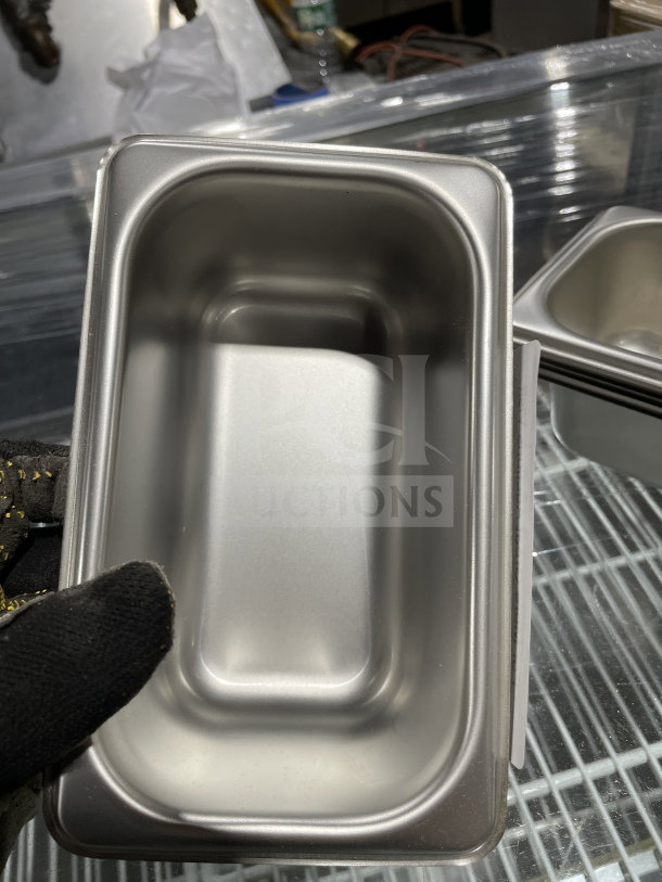 Amko commercial stainless steel steam table pan with anti-jamming corners, new condition.