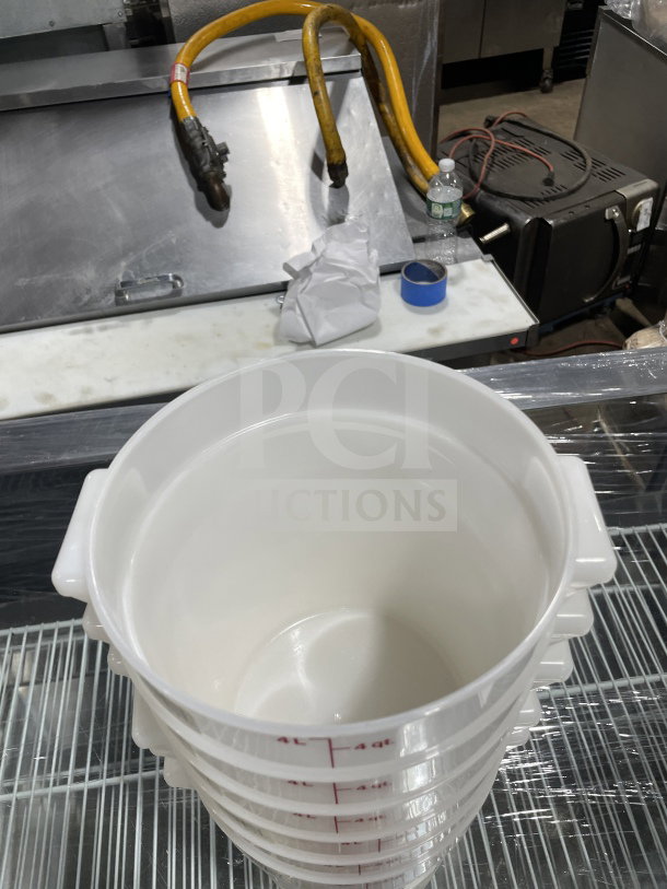 Commercial 4 Qt. translucent food storage container stack, red graduation markings, excellent condition, white, 6 available.