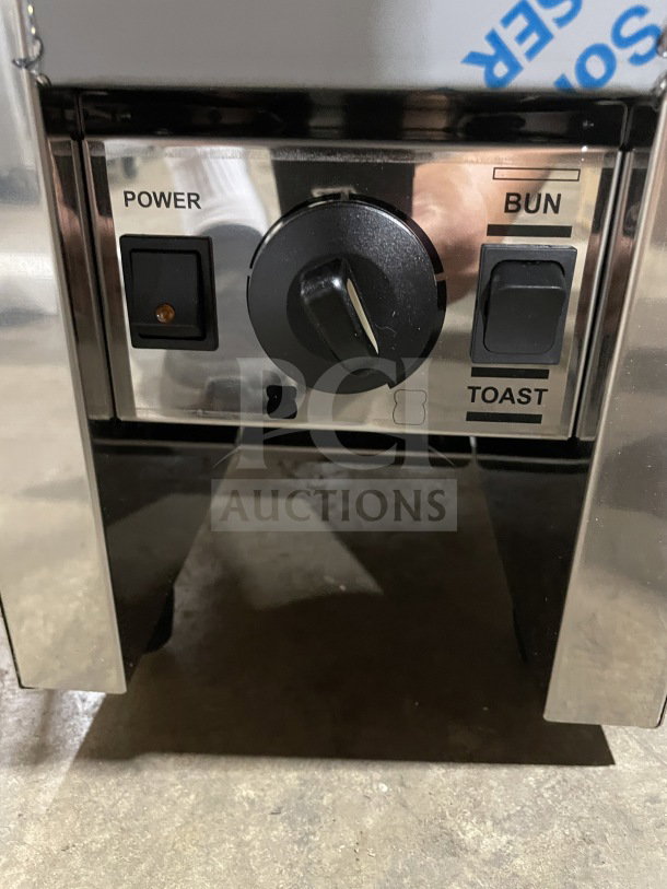 Milantoast US18011 countertop conveyor toaster, stainless steel, new condition, power and function controls visible.