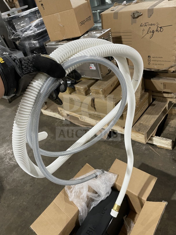 Brand new Blendtec RRS Rapid Rinser commercial unit with sprayer, base, and flexible tubing, in original packaging.