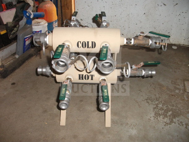 BRAND NEW Military Outdoor Water Manifold with green-handled quarter-turn ball valves. Labels indicate "COLD" and "HOT."