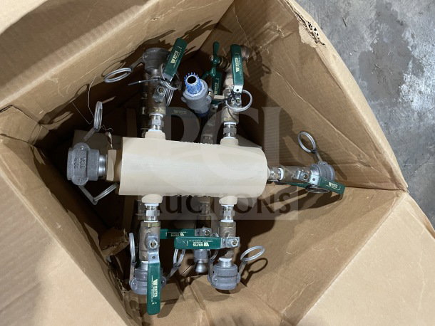Brand new military water manifold with green-handled quarter-turn ball valves, in box. Ideal for outdoor, army camp use.