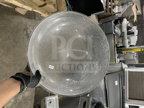Brand new Cambro Camwear pebbled polycarbonate serving bowl, heavy-duty plastic, shown with barcode sticker, clear texture.