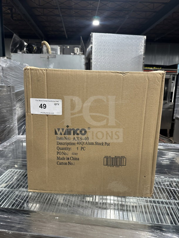 Boxed Winco 40 Qt. Super Aluminum Stock Pot, model AXS-40, new condition, with handles. Markings: item info and model.