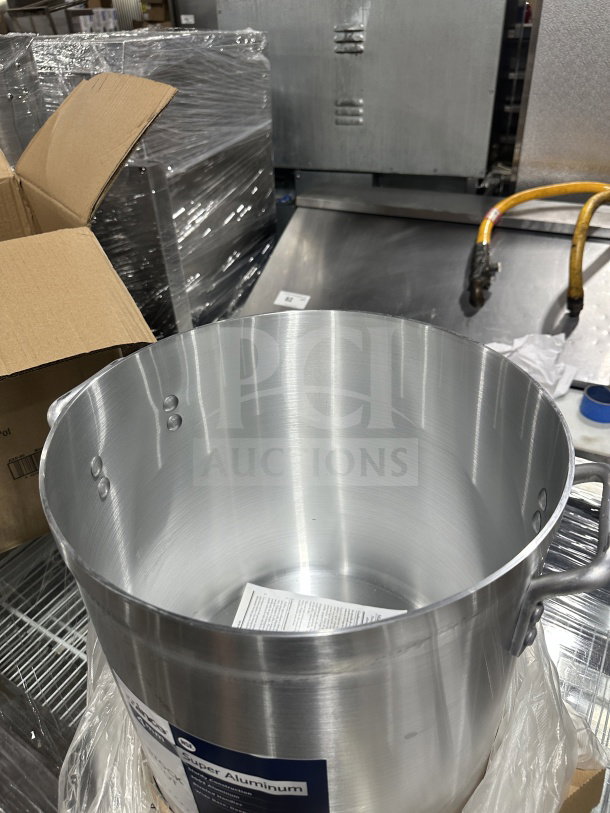 Brand new Winco AXS-40, 40 Qt. stock pot in super aluminum. Features include sturdy handles and a smooth finish.