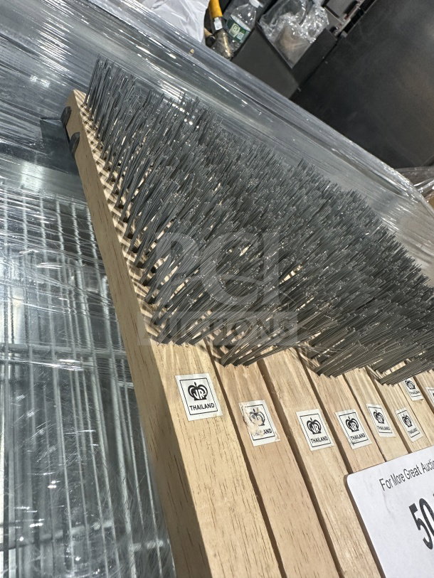 Brand new Thailand commercial heavy-duty wire scratch brushes with wooden handles, multiple units, labeled "Thailand."