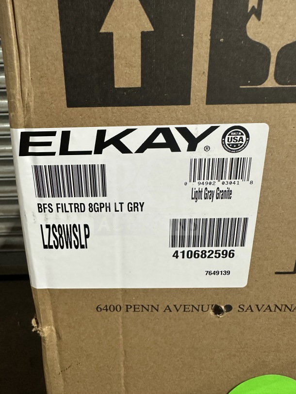 Brand new Elkay LZS8WSLP light gray granite hydration station with stainless steel cooler, model and serial on box.