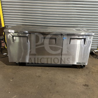 True TUC-72-HC 3-door stainless steel undercounter refrigerator on casters, new condition with poly-coated wired rack.