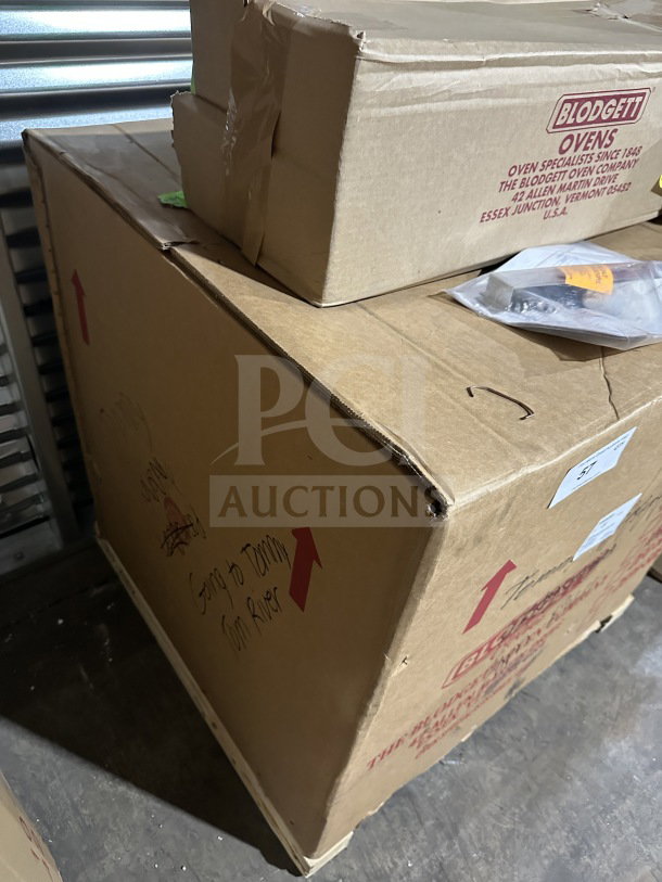 Blodgett commercial stainless steel convection oven, model 10004389, brand new in original packaging with visible labels.