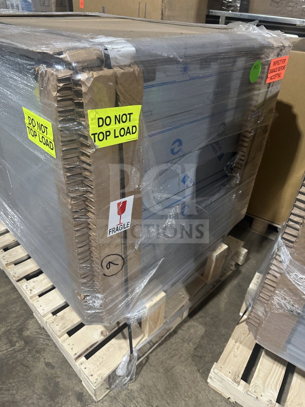 Brand new Dinex DXPICT202D commercial stainless steel 2-door 24-tray cart, with built-in pan slides, still in packaging.