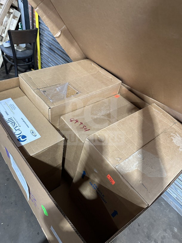 Brand new Crysalli stainless steel water chiller in box, 120V, 1 phase, electric-powered for sparkling or still water.
