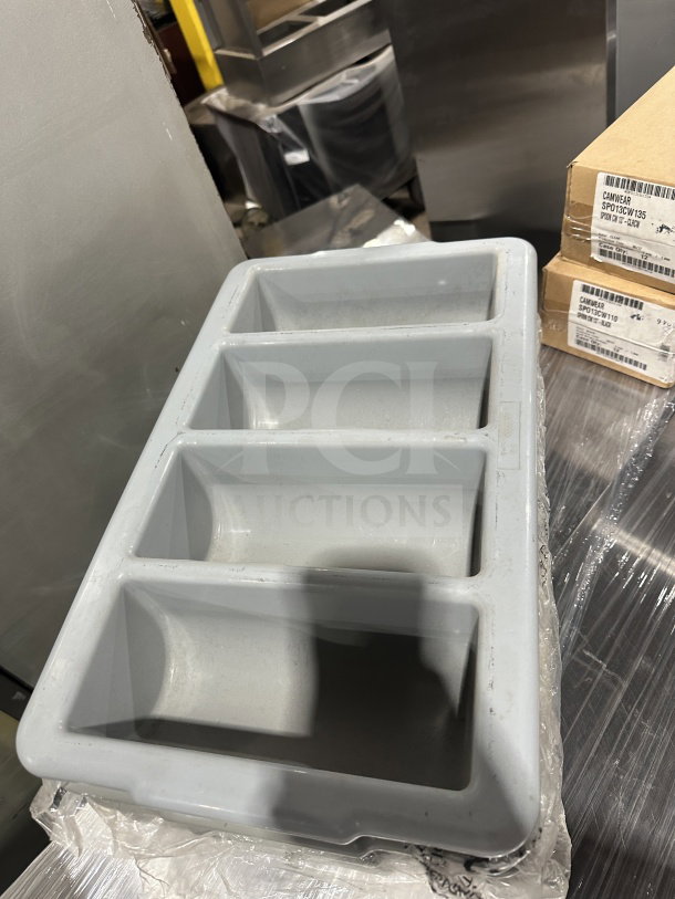 Brand new gray polyethylene 4-compartment flatware box. Ideal for organizing cutlery, durable material.