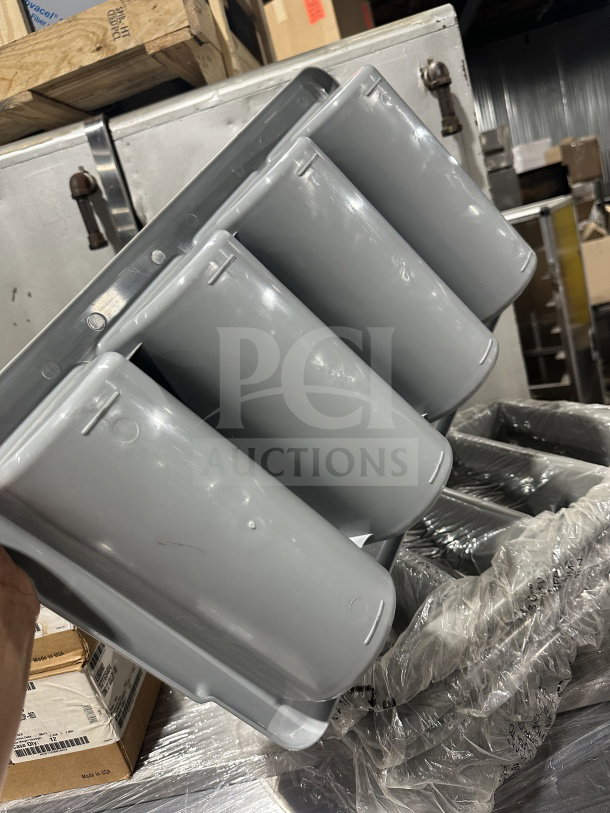Brand new gray polyethylene 4-compartment cutlery box, shown in packaging, ideal for organizing flatware.