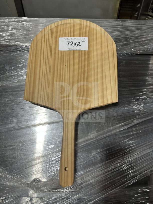 New Winco wooden pizza peel, model WPP1222, 12"x13" blade, 9" handle. Auction tag indicates "72X2" quantity.