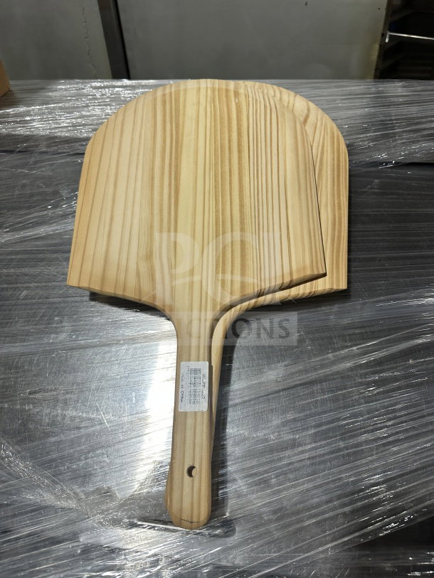 Winco WPP-1222 wooden pizza peel, 12"x13" blade, 9" handle, new condition, label visible on handle.