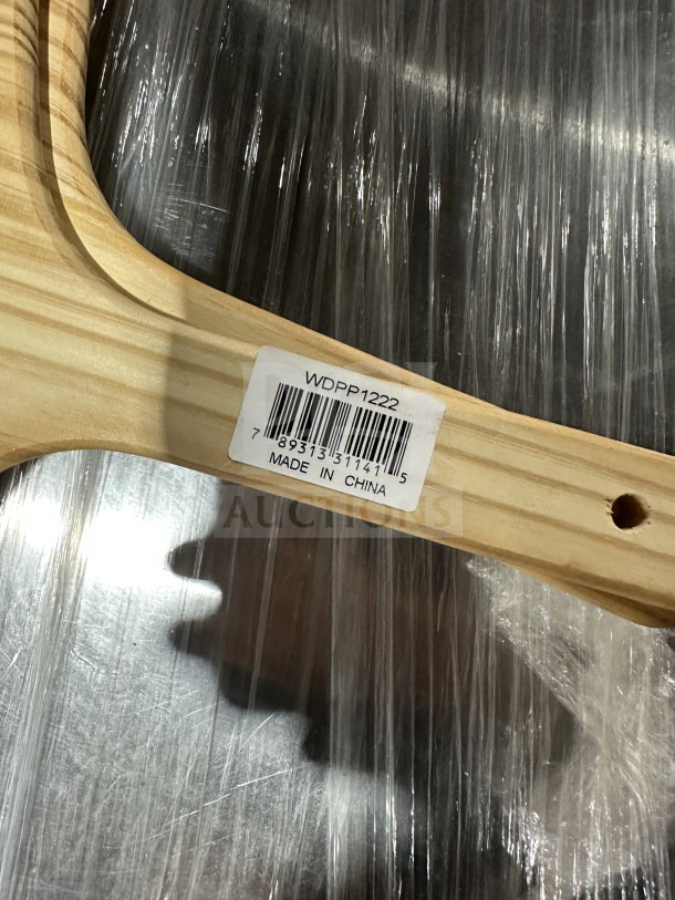 Winco wooden pizza peel WPP1222, new, 12"x13" with 9" handle, label marked WDPP1222, made in China, ideal for commercial use.