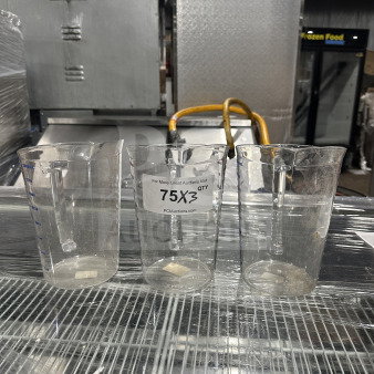 Three Cambro Camwear Series clear polycarbonate 2 Qt. measuring cups, Model 200MCCW, new condition with auction label.