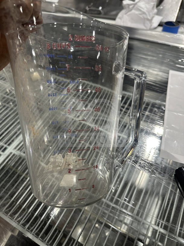 Cambro Camwear 2 Qt. clear polycarbonate measuring cup, model 200MCCW, with red and blue markings, new condition.