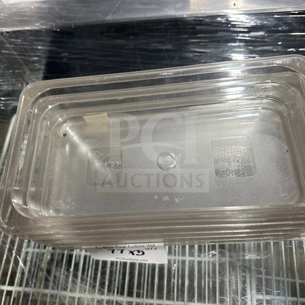 New Thunder Group PLPA8132 polycarbonate 1/3 food pan, clear, commercial-grade, sealed packaging, stackable design.