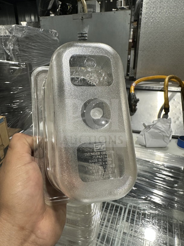 Thunder Group PLPA8194 clear polycarbonate food pan, 1/9 size, 4" deep. New condition, labeled with model and size details.
