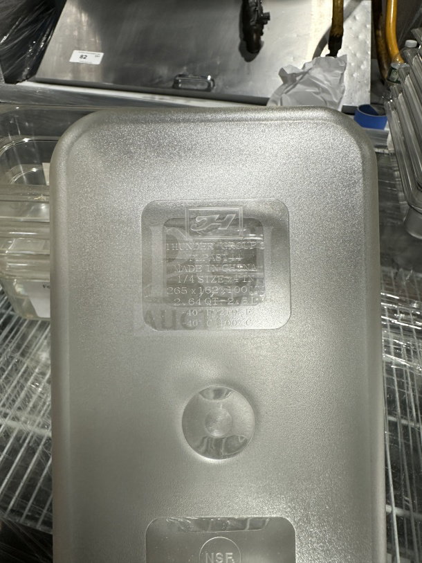 Thunder Group PLPA8144 clear polycarbonate food pan, 1/4 size, 4" deep, new condition. NSF certified. Made in China.