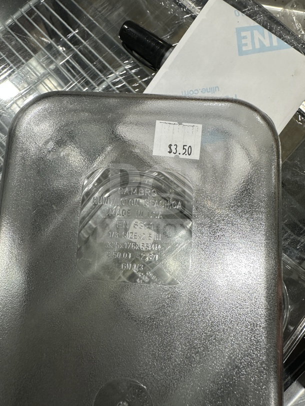 New Cambro 1/3 size clear polycarbonate food pan, Model 631-1, 2.5" deep, with $3.50 label. Made in USA.
