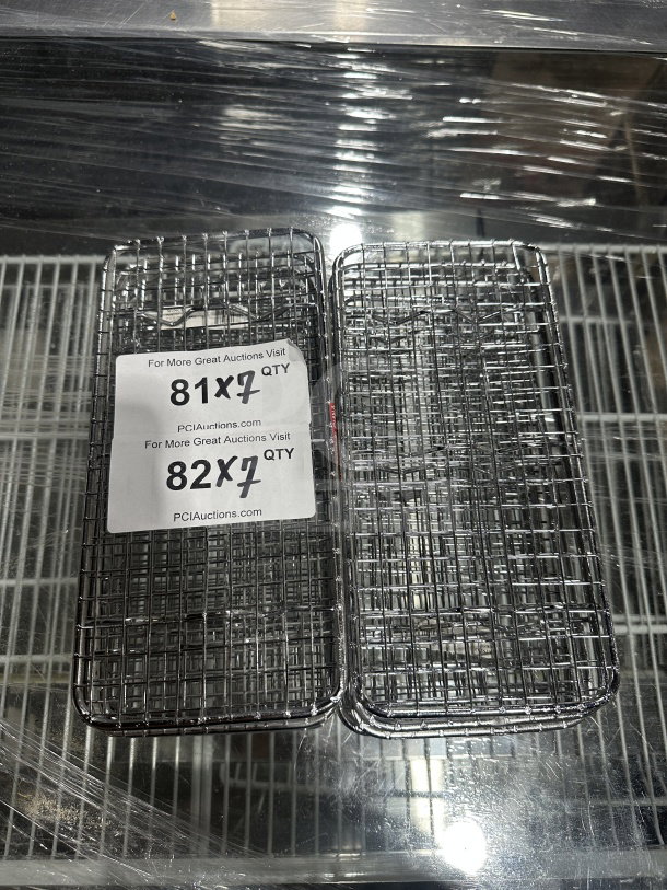 Winco PGW-510 chrome pan grate, 5x10.5", new condition, for steam pans. Tags indicate model and auction details.
