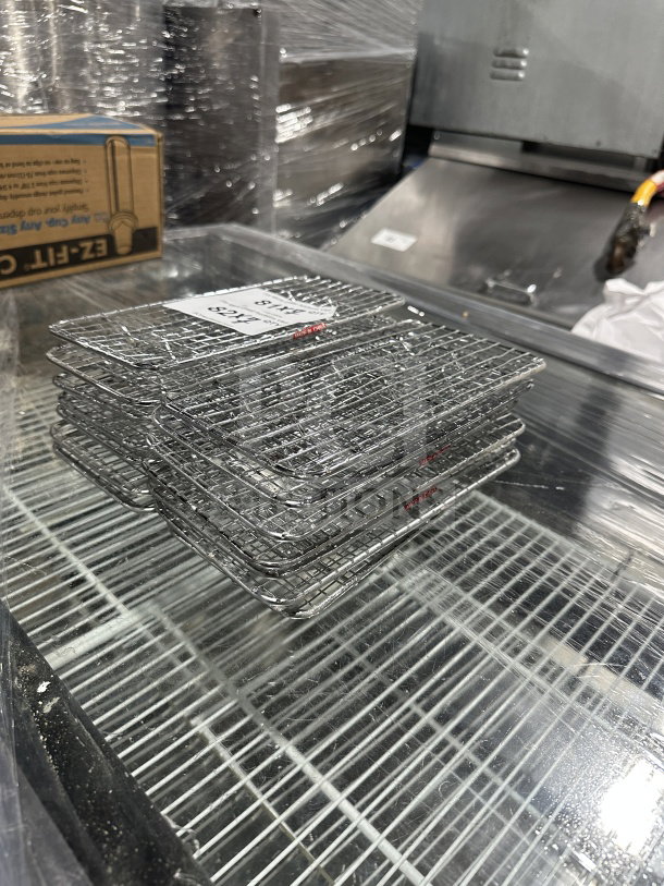 Winco PGW-510 commercial chrome pan grate, new condition, 5x10.5 inches, stack of multiple grates, SN: 811642000781.