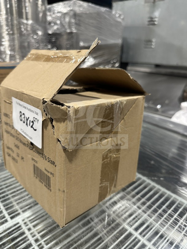 Brand new Winco SPSCS 1/6 size solid stainless steel steam table pan cover in original box, visible wear on box edges.