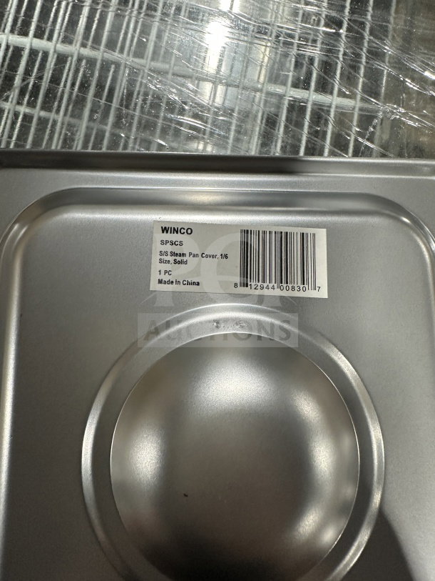 Brand new Winco SPSCS 1/6 size stainless steel steam table pan cover with label, made in China.