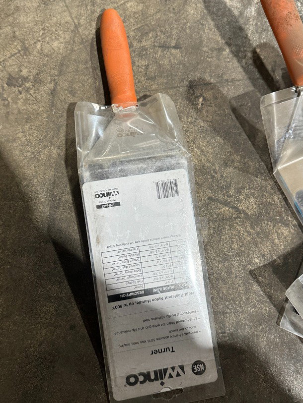 Winco stainless steel offset turner TNH-42, new in packaging, 8"x4" blade, orange Cool Heat handle, NSF certified.