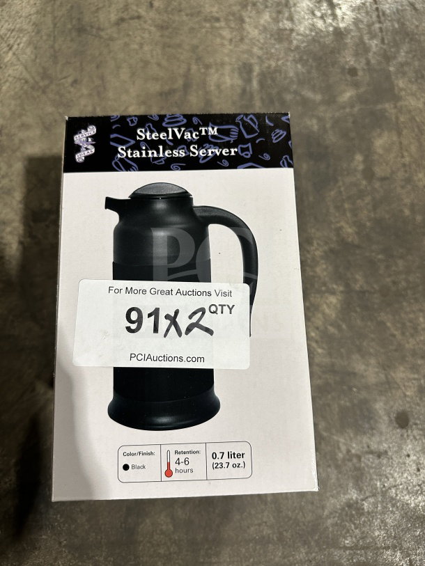 Service Ideas SteelVac stainless beverage server, 0.7L, black finish, retains heat 4-6 hours. Box shows item image and specifications.