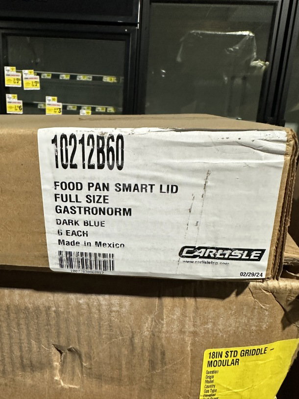 Brand new Carlisle 10212B60 full-size food pan smart lid, dark blue, polyethylene, in original packaging. Made in Mexico.