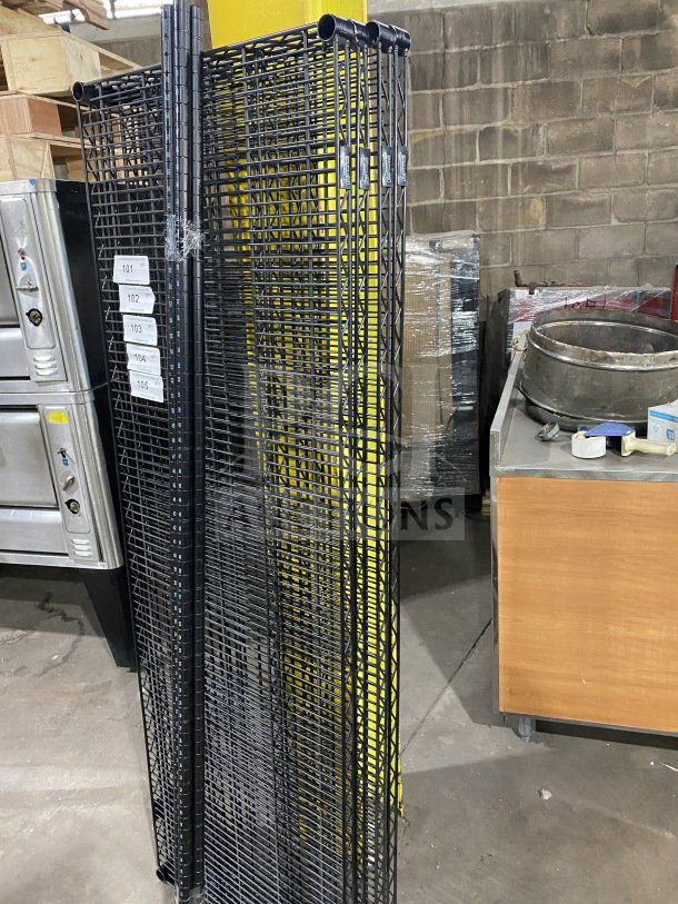 NEW Quantum 24x72" black carbon steel wired shelf, commercial-grade. Unused, pristine condition with visible size markings.