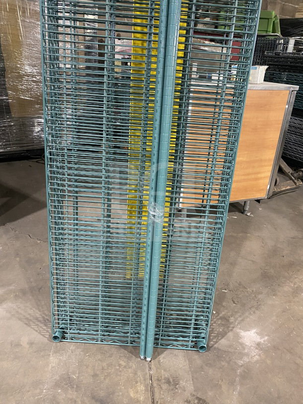 Quantum carbon steel wired shelf, blue-gray, 24x72 inches, new condition, commercial grade.