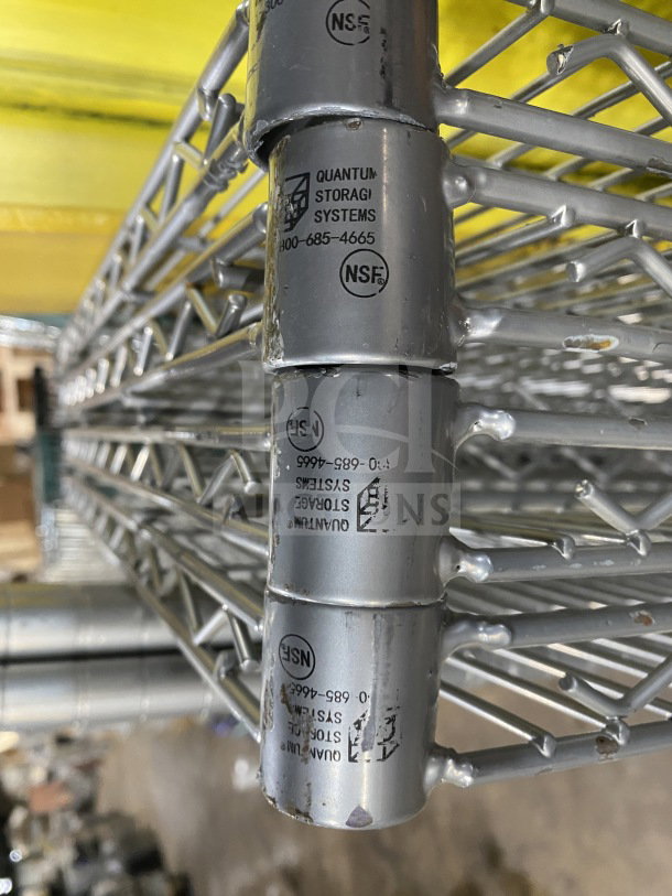 NEW Quantum 24x72" silver wired shelf, carbon steel, excellent condition. Quantum Storage Systems label visible.