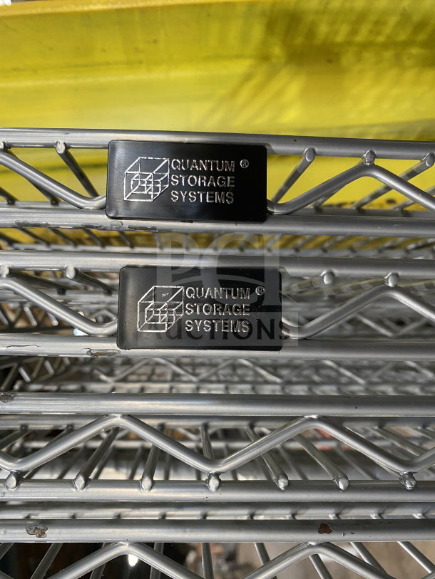 New Quantum commercial carbon steel wired shelf, silver, 24x72 inches, with "Quantum Storage Systems" branding tag.