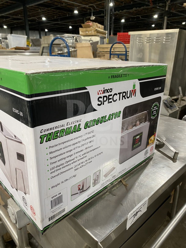 Winco Spectrum Series stainless steel sous vide cooker, model ESVC-28, new in box. Features digital control panel, 7.4 gal capacity.